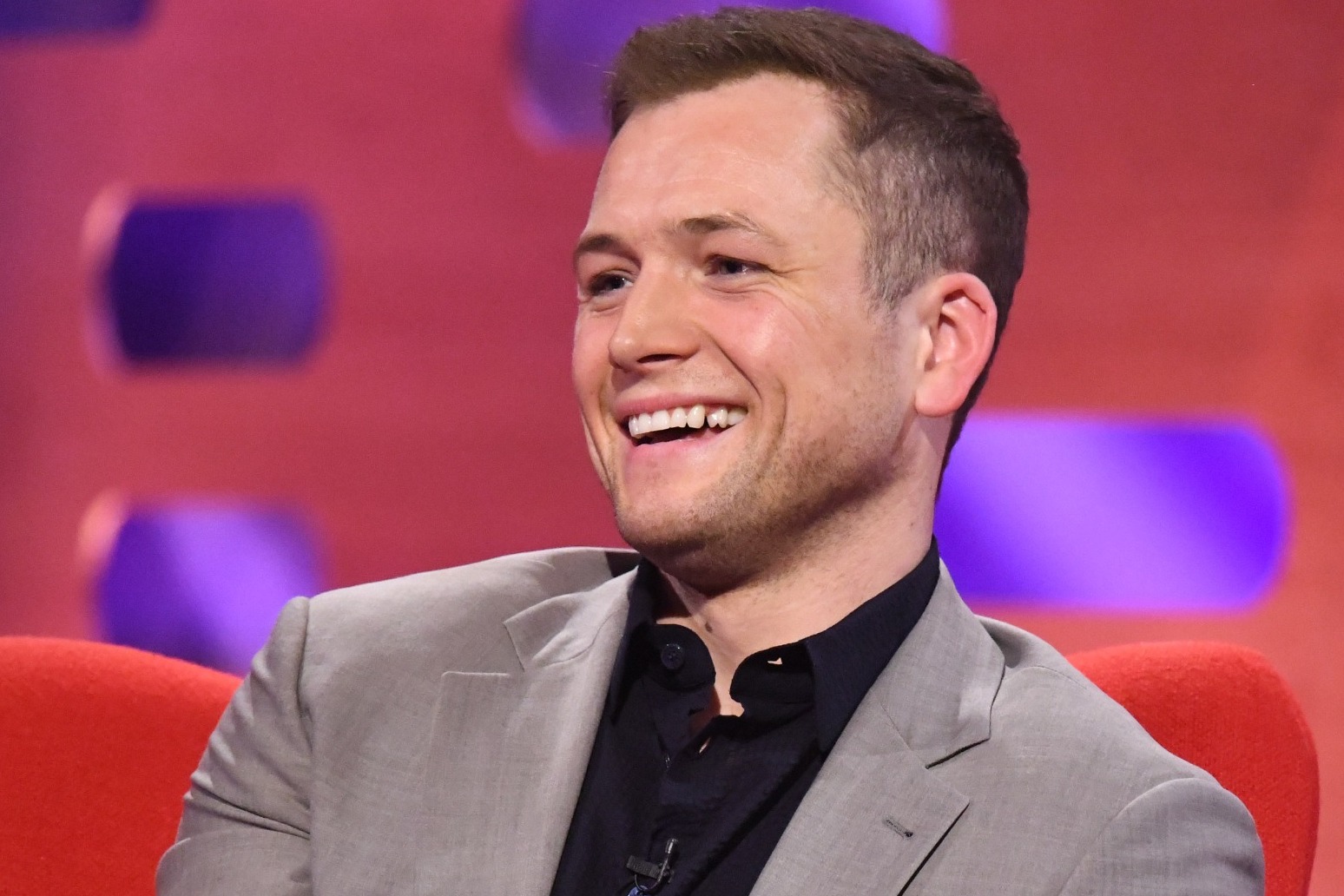 Taron Egerton says he is completely fine after fainting during West End play