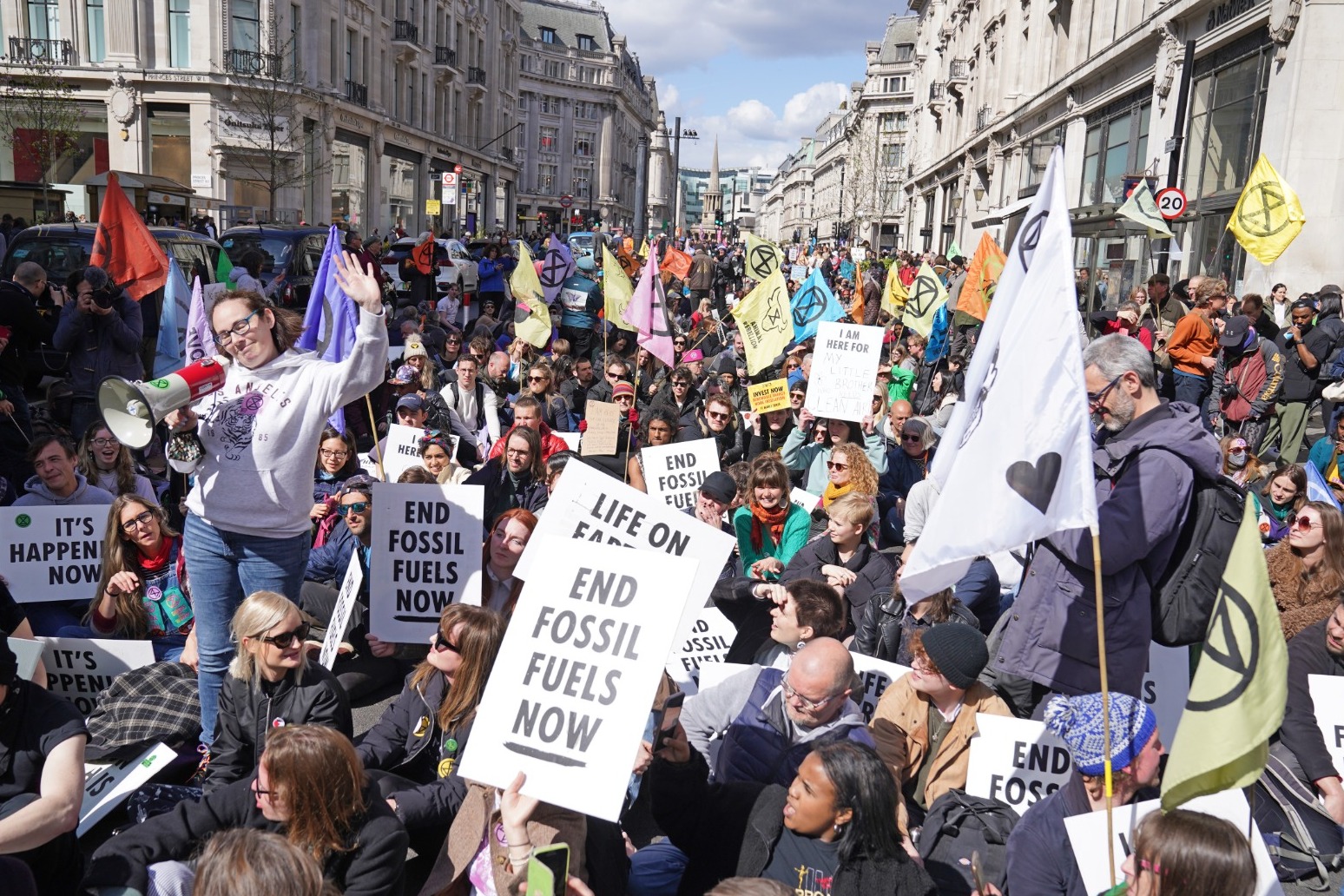 Extinction Rebellion stage sit down protest in central London