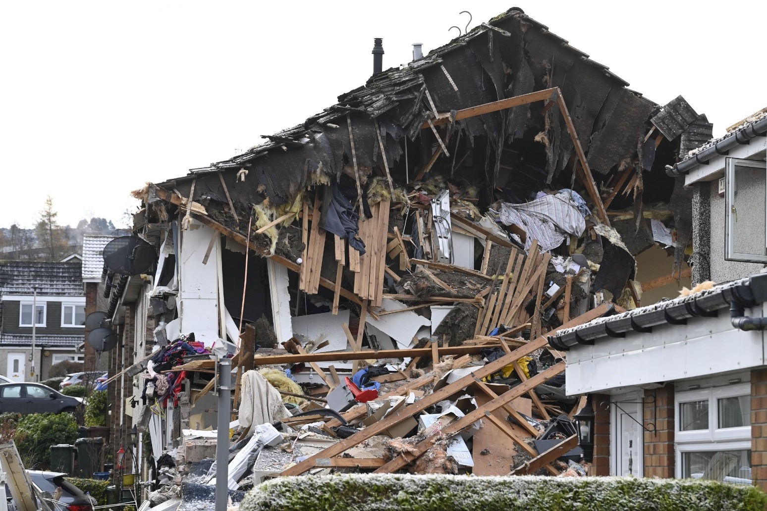 Man 84 dies and two taken to hospital after house explosion in Edinburgh