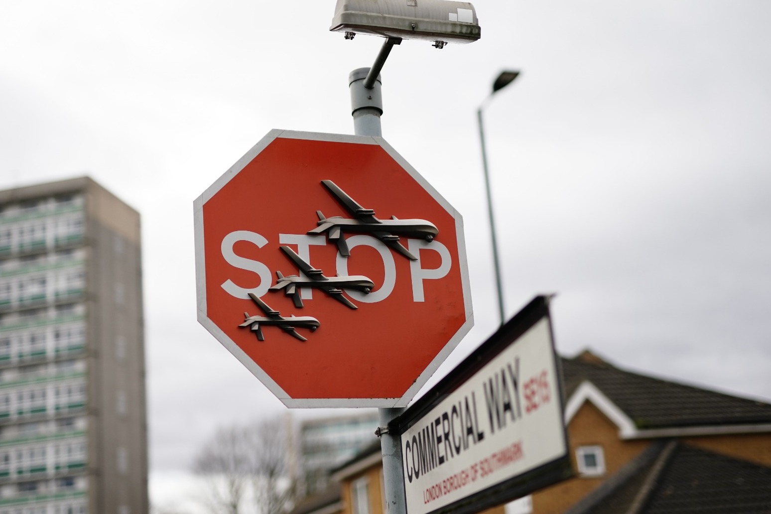 Man arrested over removal of Banksy road sign 