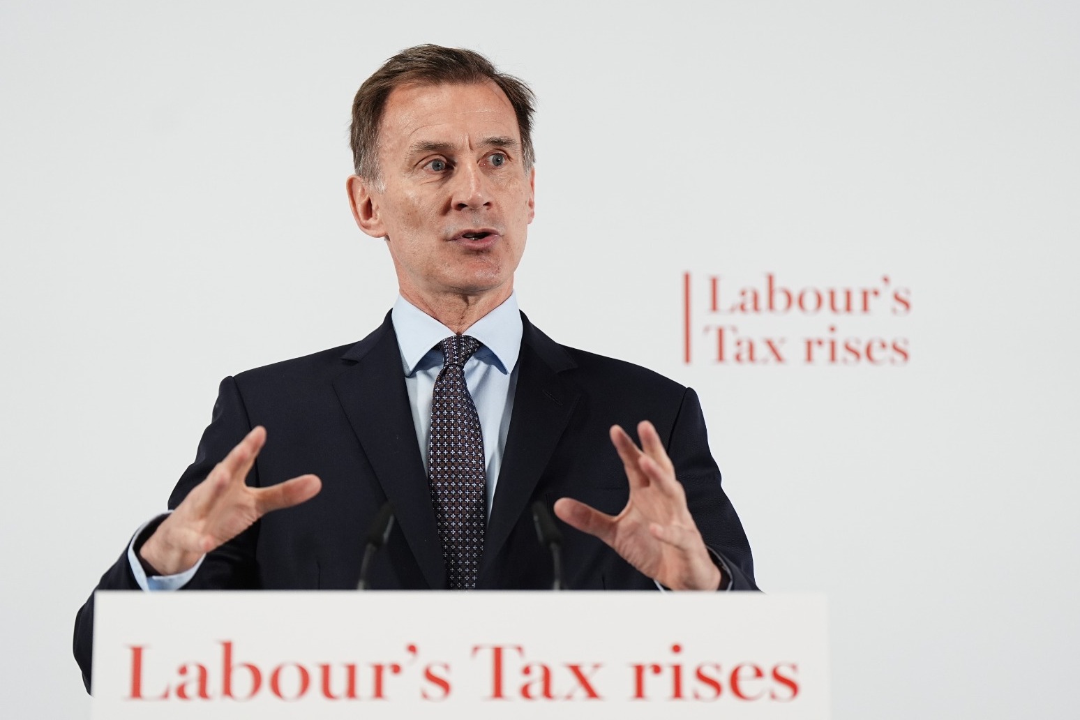 Hunt declines to guarantee tax cuts