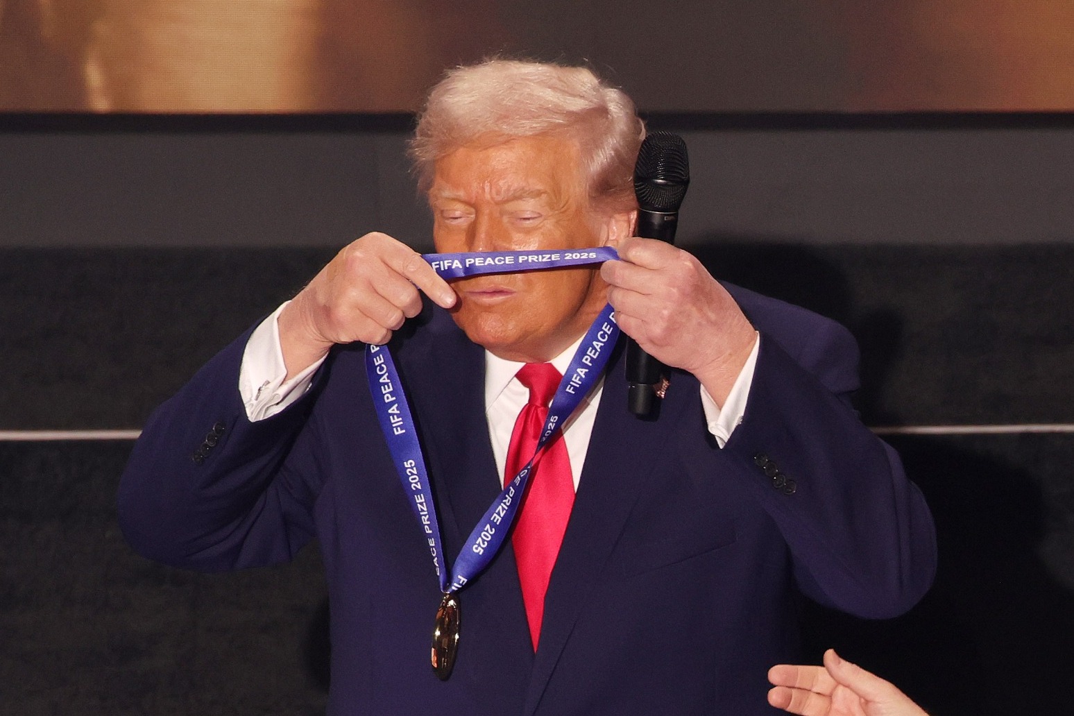 Donald Trump awarded inaugural FIFA peace prize at World Cup draw