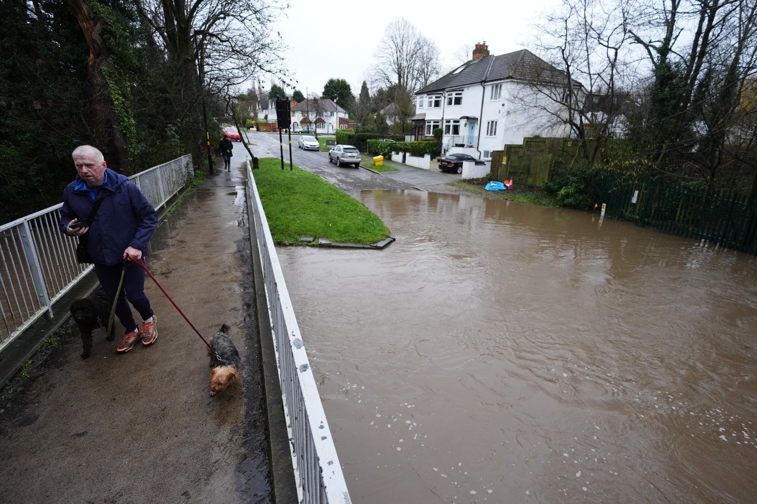 Storm Chandra brings flooding, travel disruption and school closures across UK 