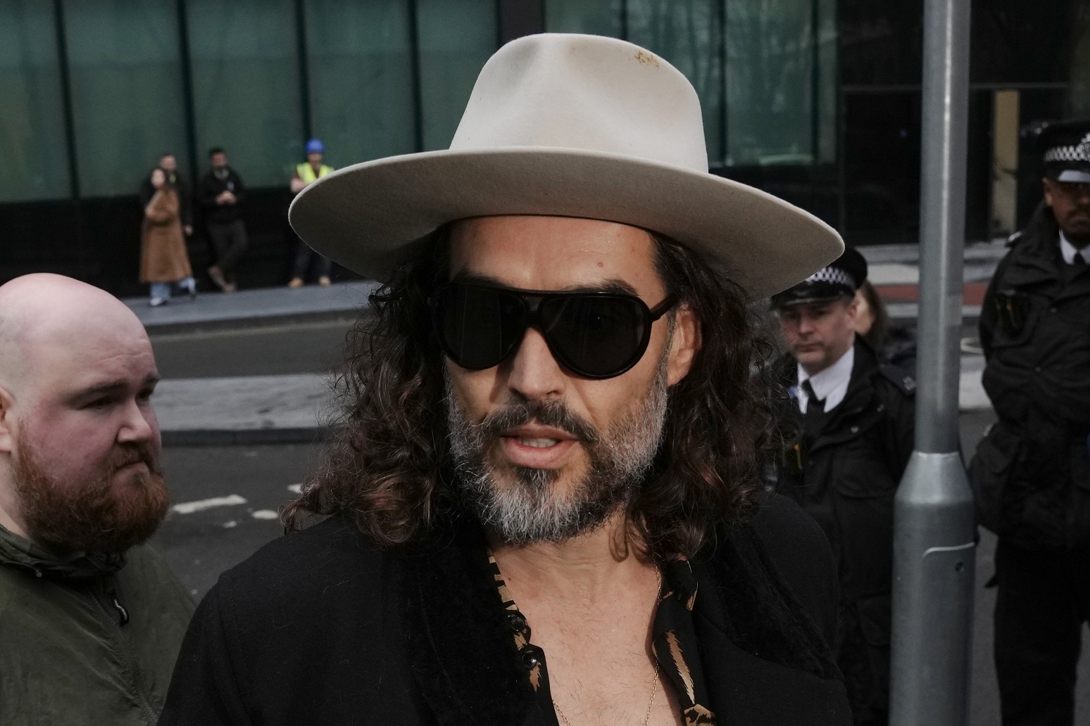 Russell Brand’s rape trial delayed until October