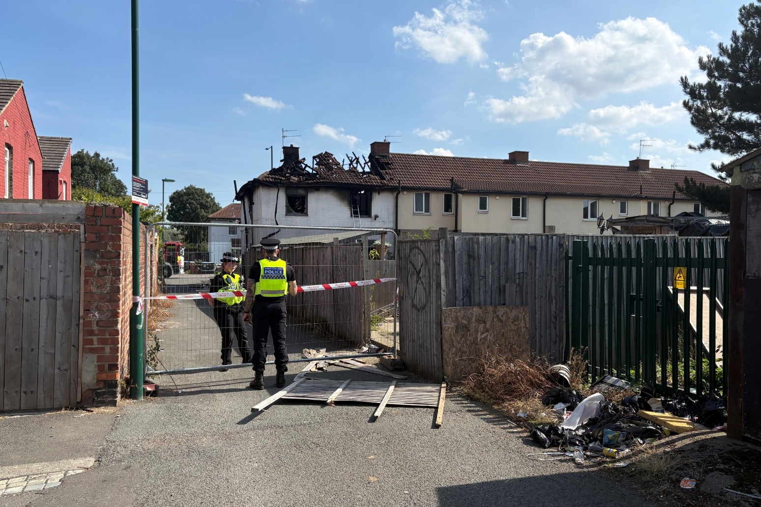 Murder probe launched after two killed and four injured in house fire