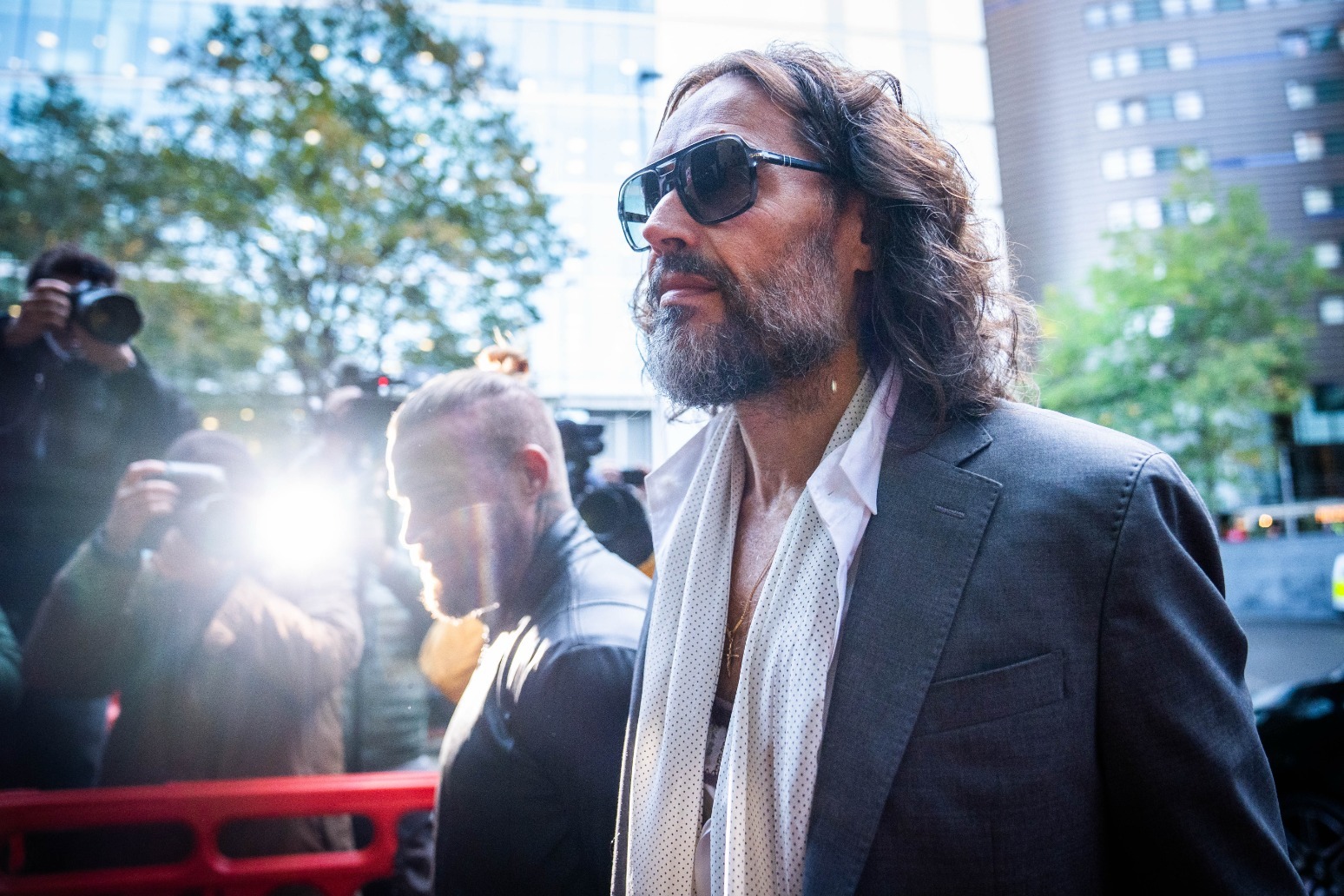 Russell Brand rape accuser did not think police would believe her, court hears