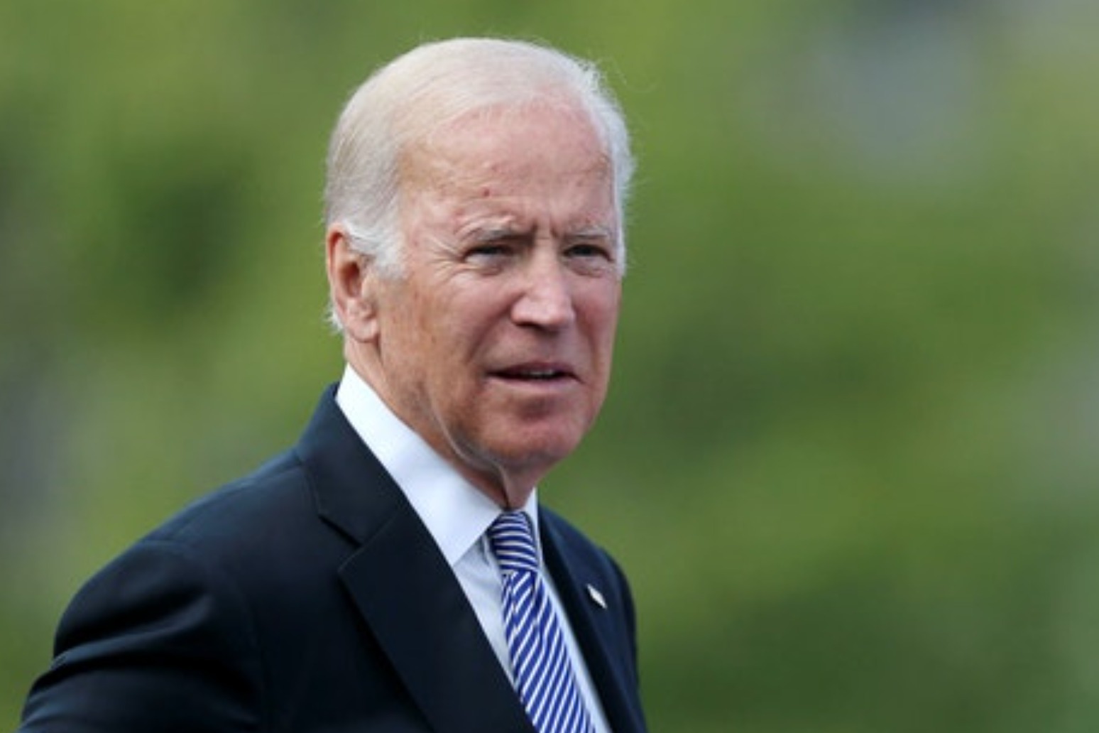Biden defends health care law as court mulls its fate 