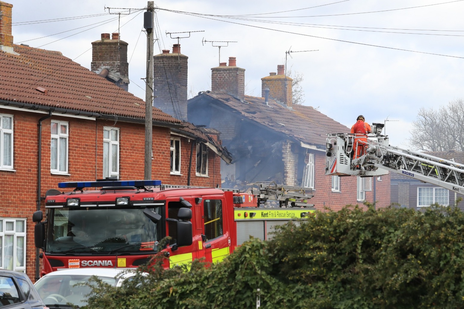 Firefighters tackle blaze following explosion at house 