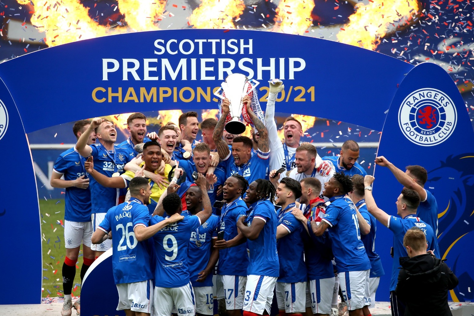 Thousands of Rangers fans take to streets to celebrate title win 