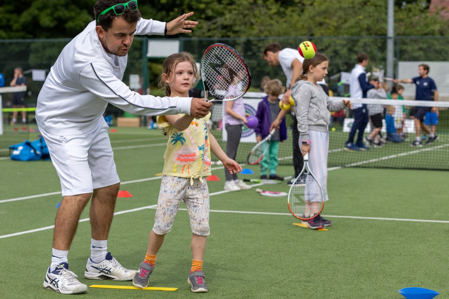 Hundreds of people gather for Thank You Day event at Wimbledon. 