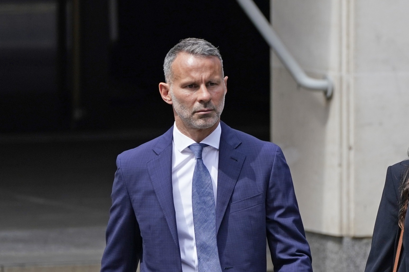 Giggs ‘kicked ex in back and threw her naked out of hotel room’, court told 