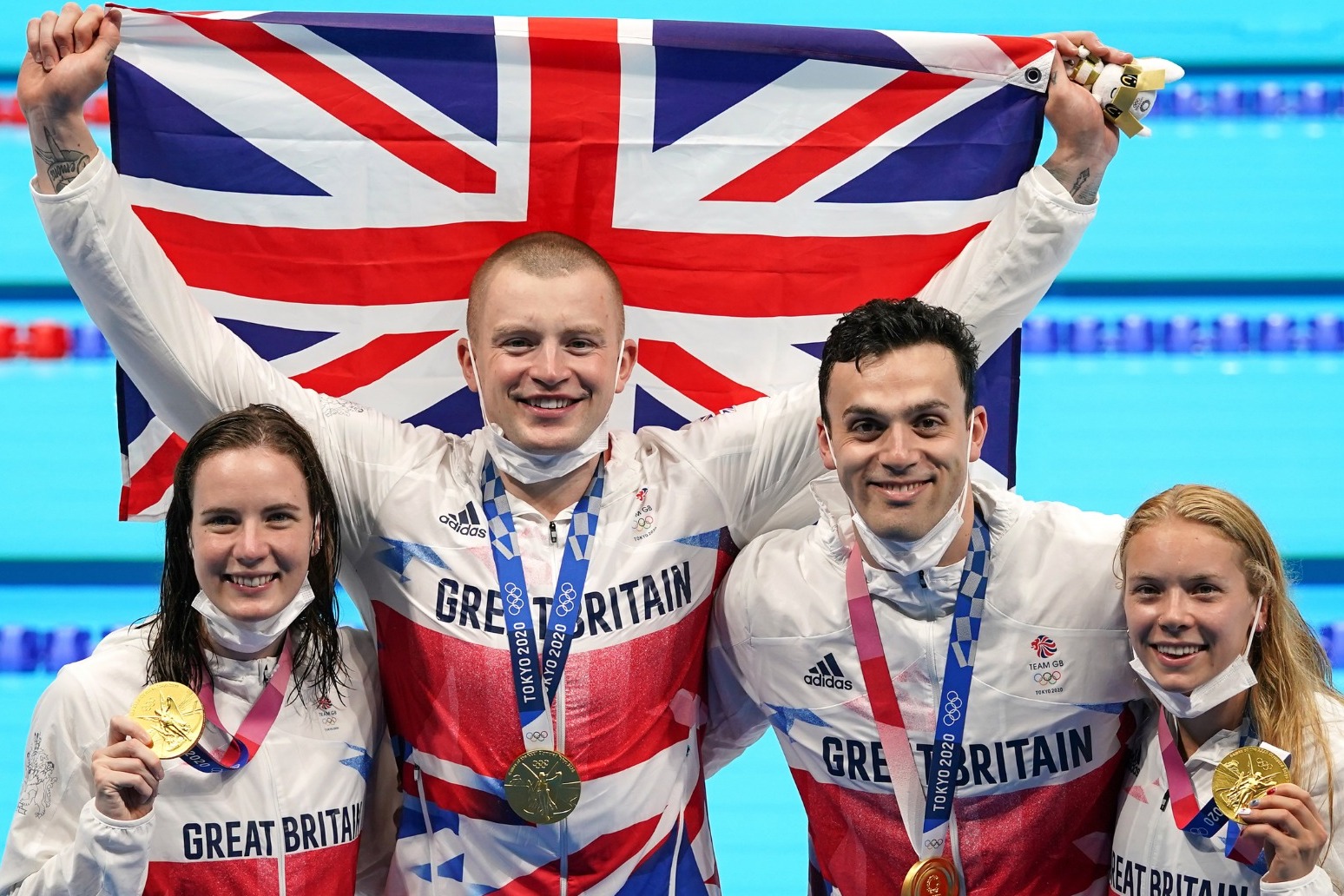 Team effort as GB quartets grab golds in swimming and triathlon relays 