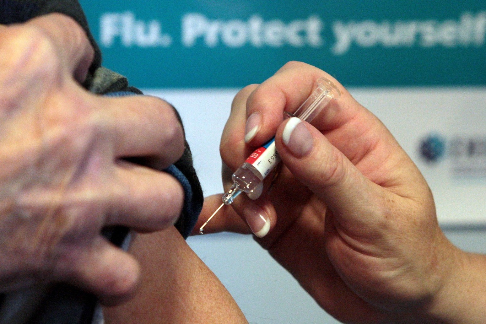 People urged to get flu and Covid booster vaccines to help NHS cope 
