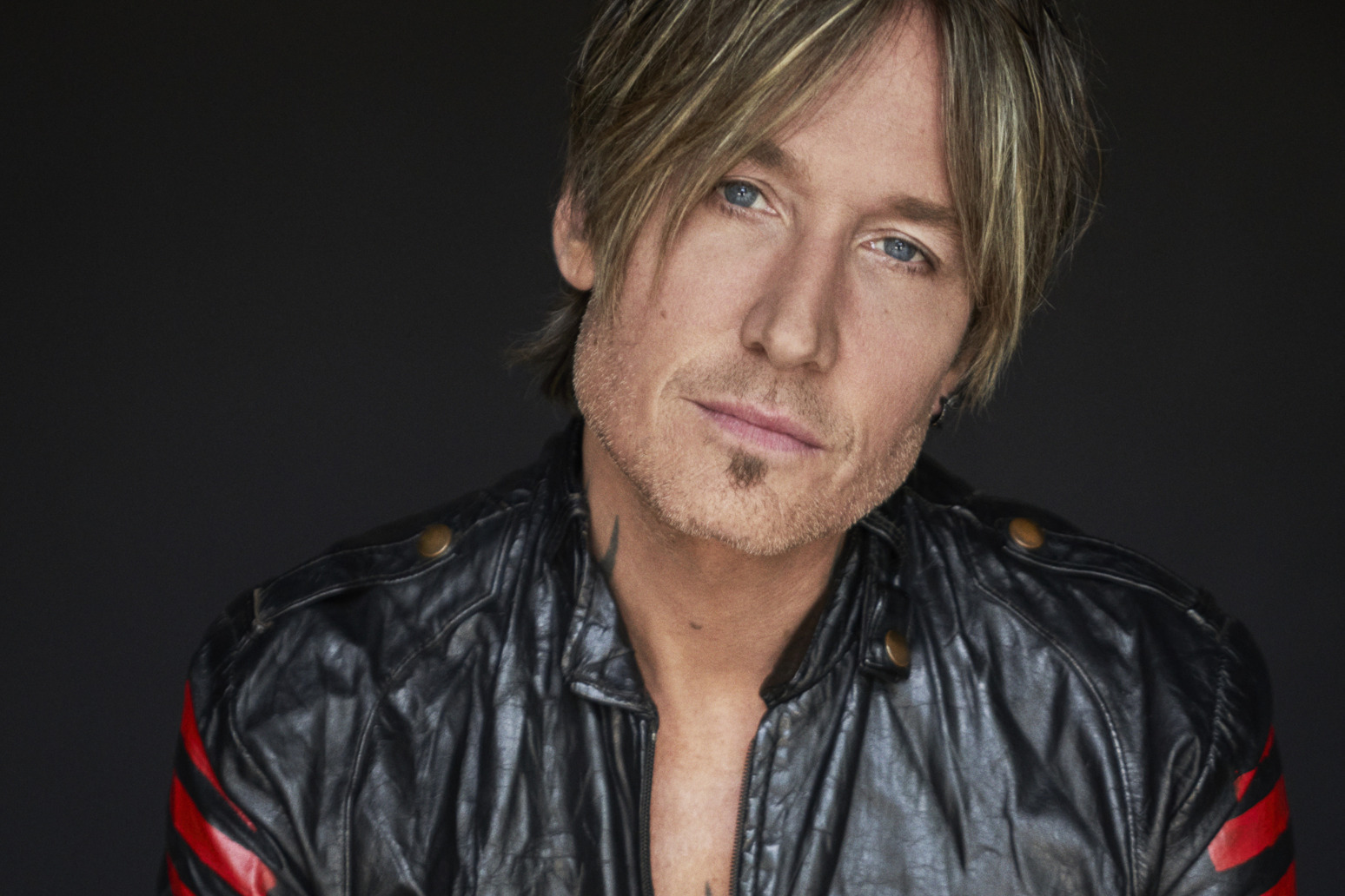 Keith Urban says he\'s found a balance between his touring commitments and home life 