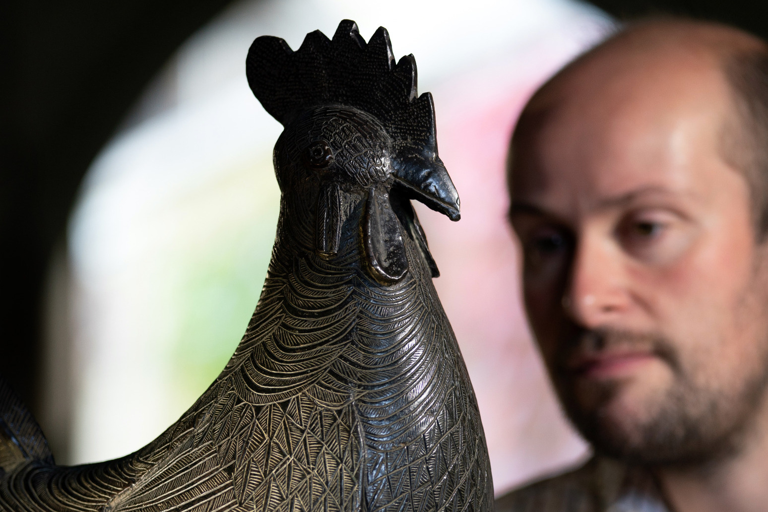 Cambridge college to return looted cockerel statue to Nigeria 