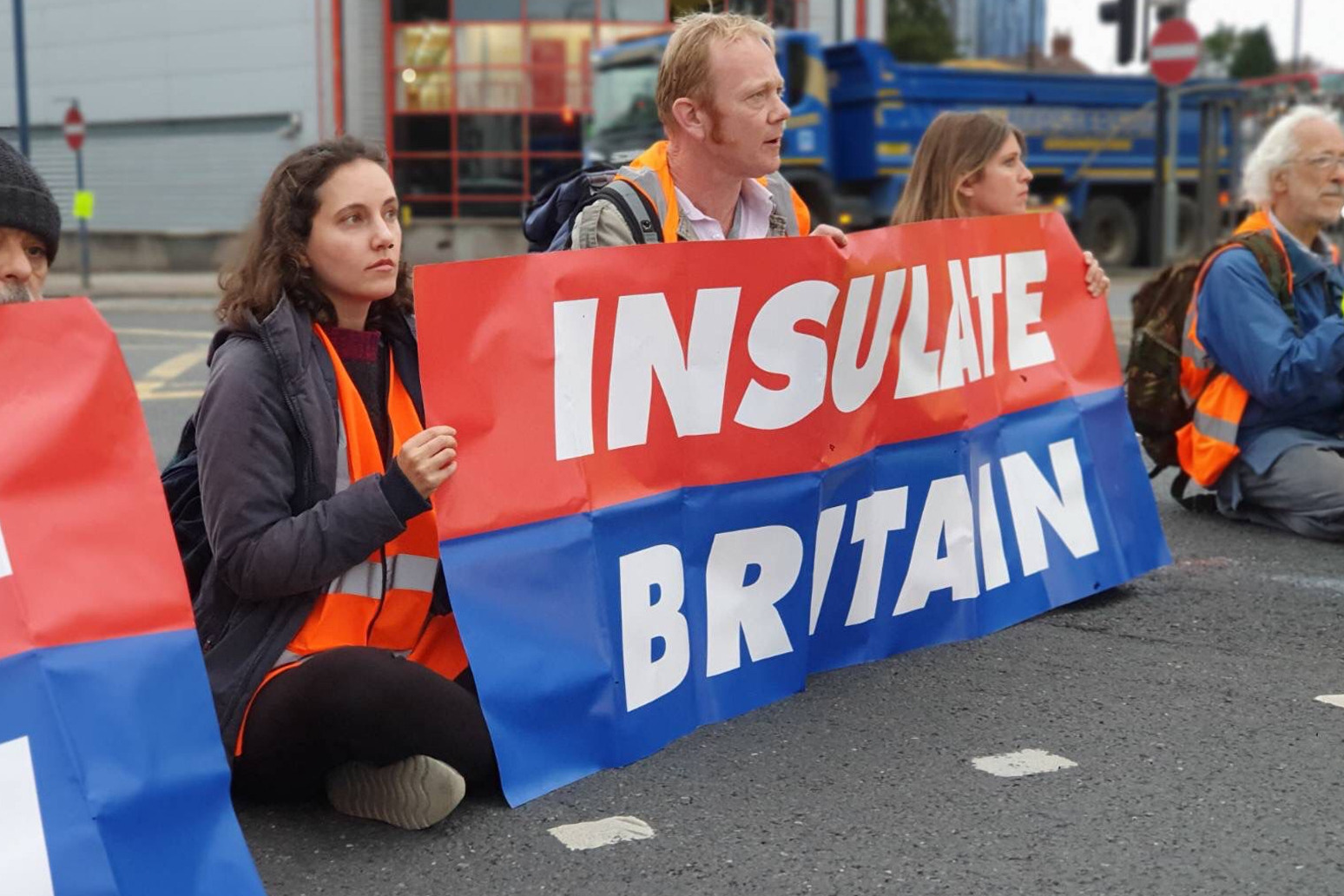 Insulate Britain protesters squirted with ink as they block roads 