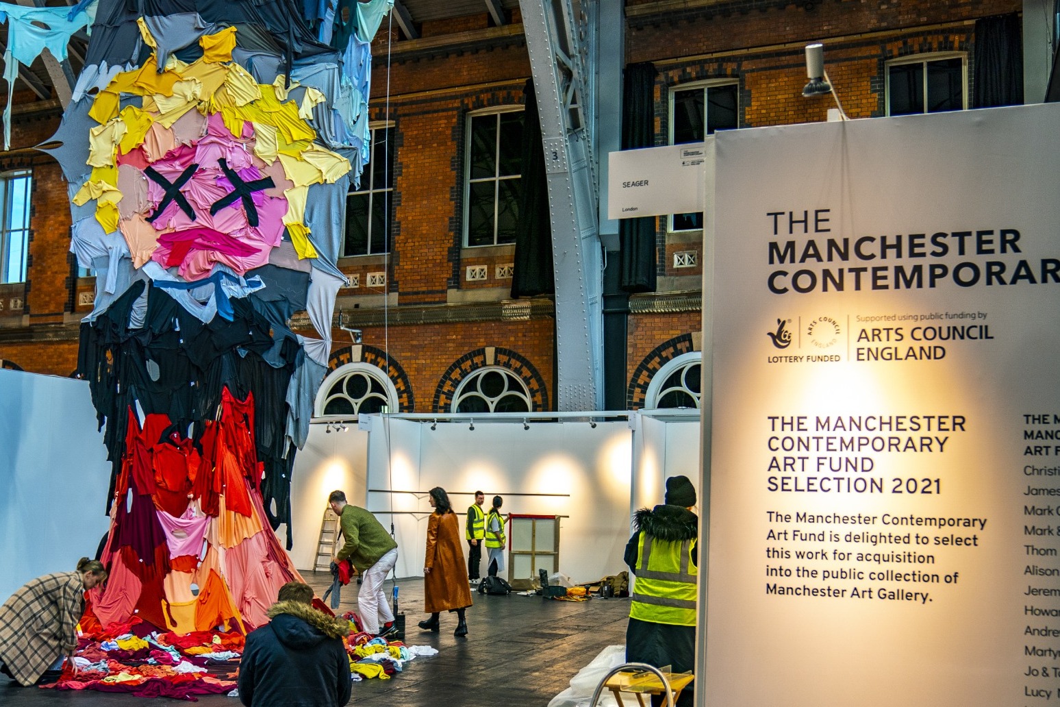 Students send climate message with giant Boris Johnson artwork made from clothes 