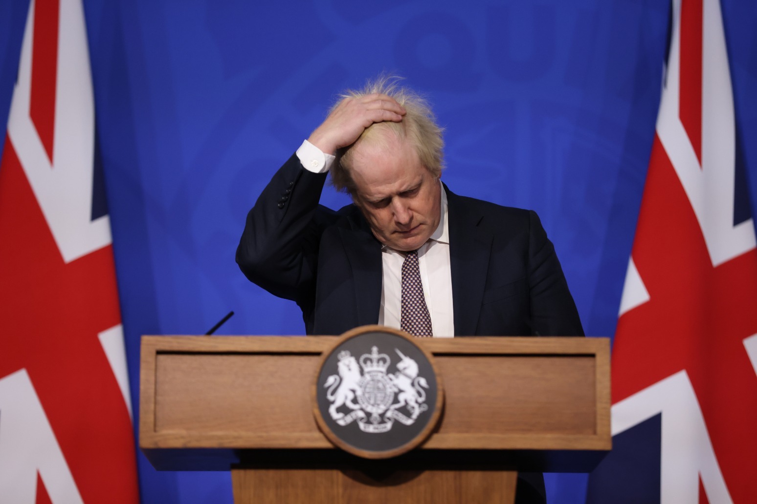 Boris Johnson announces tightening of coronavirus rules after Omicron reaches UK 