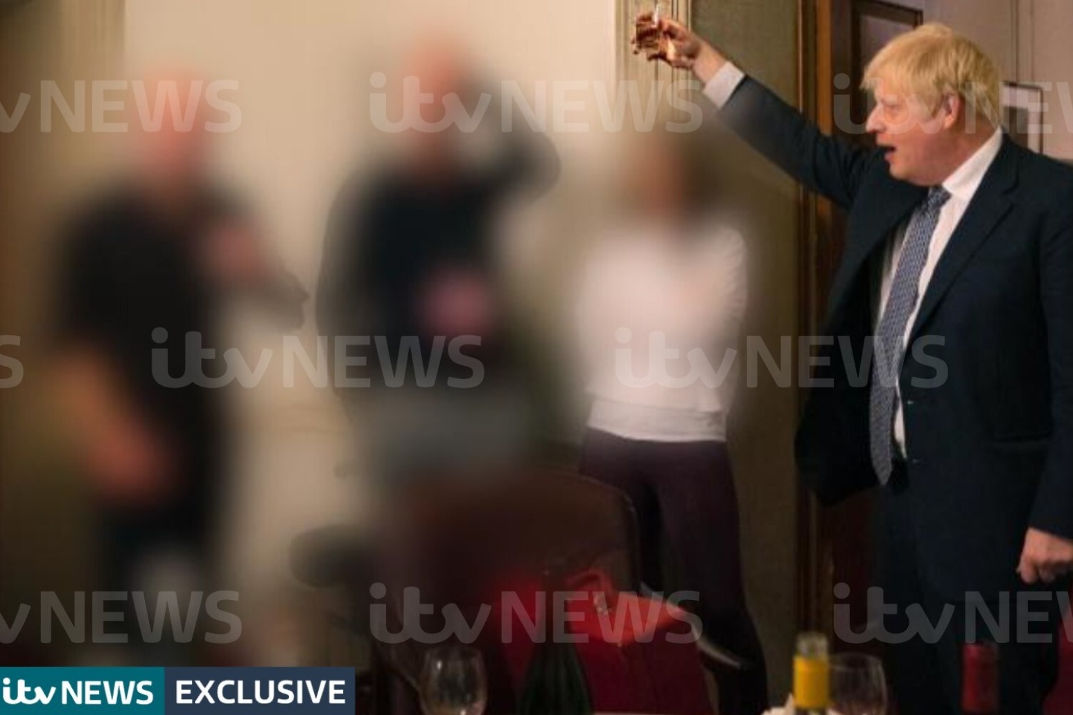 Pictures show Boris Johnson raising glass during lockdown leaving party 