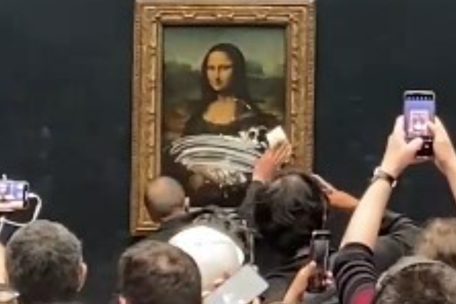 ‘Jaw-dropping’: Man disguised as woman in wheelchair hurls cake at Mona Lisa 