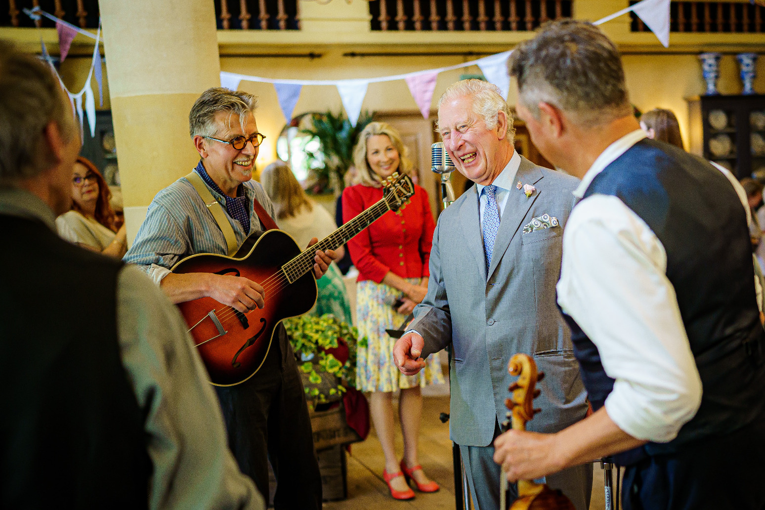 Charles swings into Queen’s jubilee with Jools Holland at Highgrove tea dance 