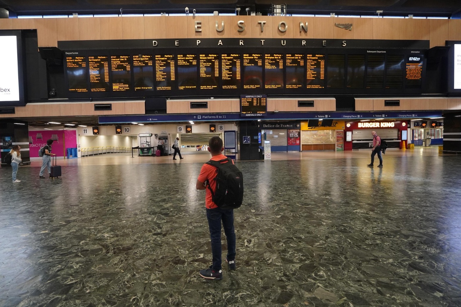 Stations deserted as start of rail strike means no early-morning trains 