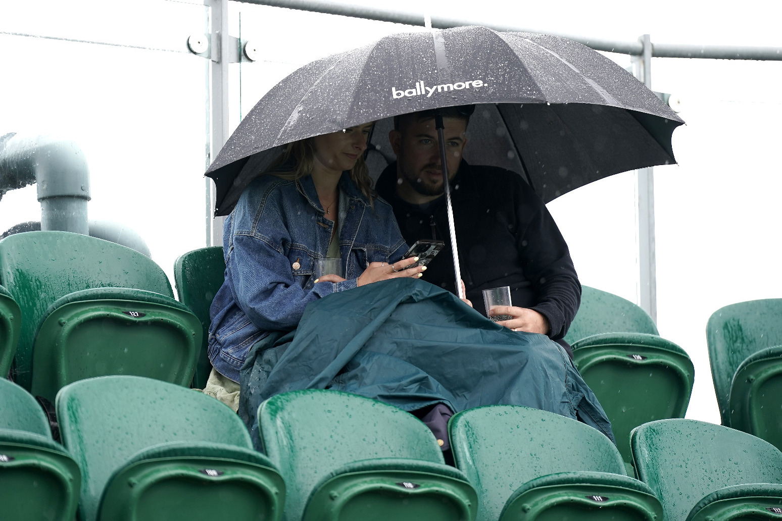Rain makes early appearance as Wimbledon gets under way 