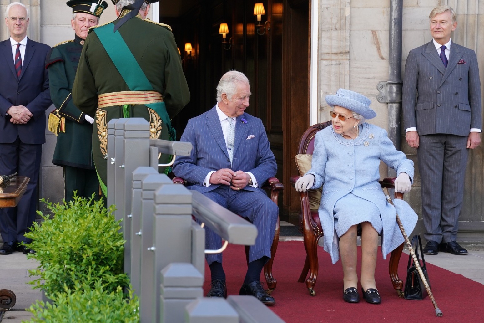 The Queen jokes with Duke of Buccleuch at Reddendo parade in Scotland 