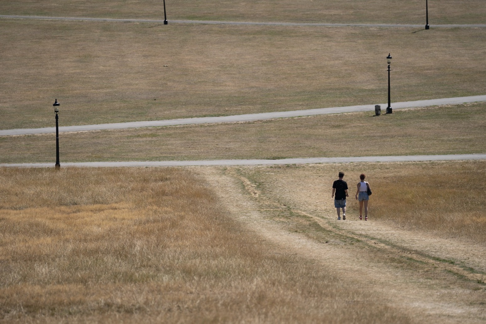 Areas in UK hit by water shortages and grass fires as temperatures start to rise 