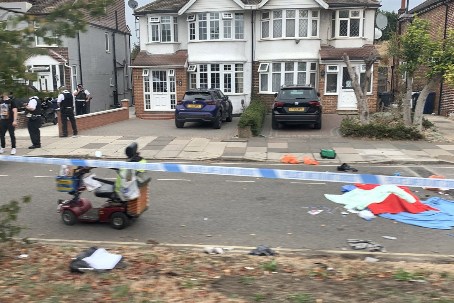 Elderly man on mobility scooter stabbed to death in west London 