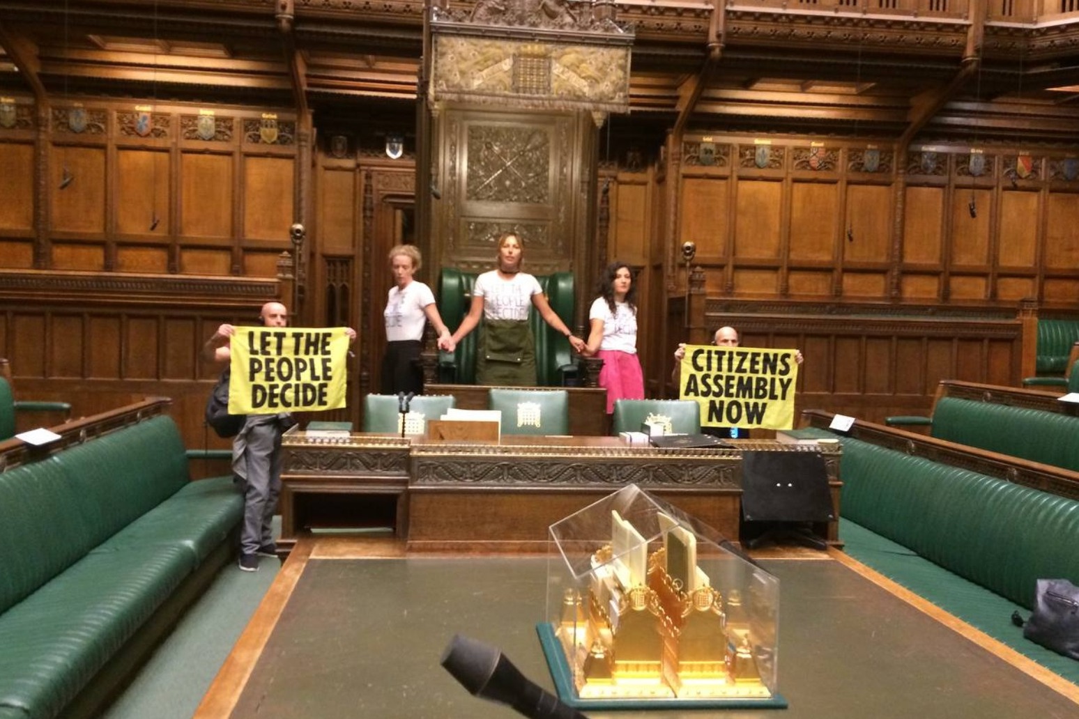 Extinction Rebellion activists ‘superglue’ themselves in Commons chamber 