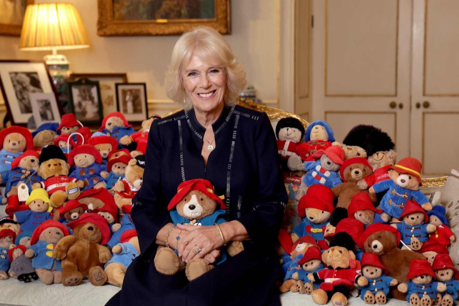 Camilla surrounded by Paddingtons as tributes to Queen donated to Barnardo’s 