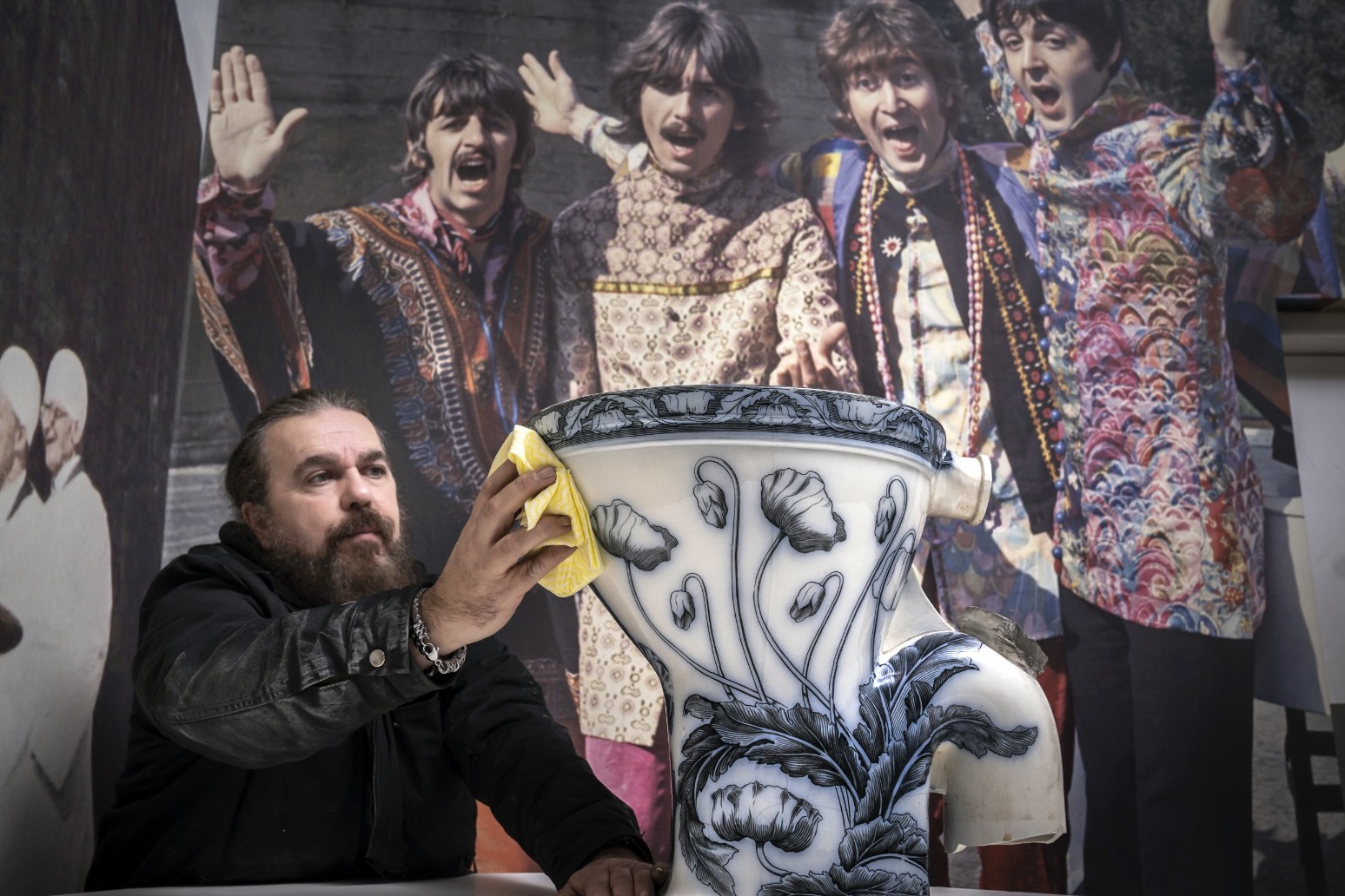 Beatles fans were flushed with excitement as John Lennon’s toilet went on display in a museum. 