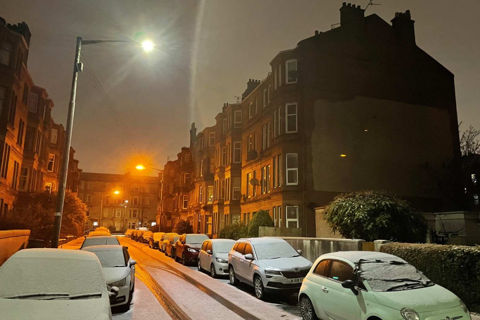 Amber weather warning in force as snow brings travel disruption 