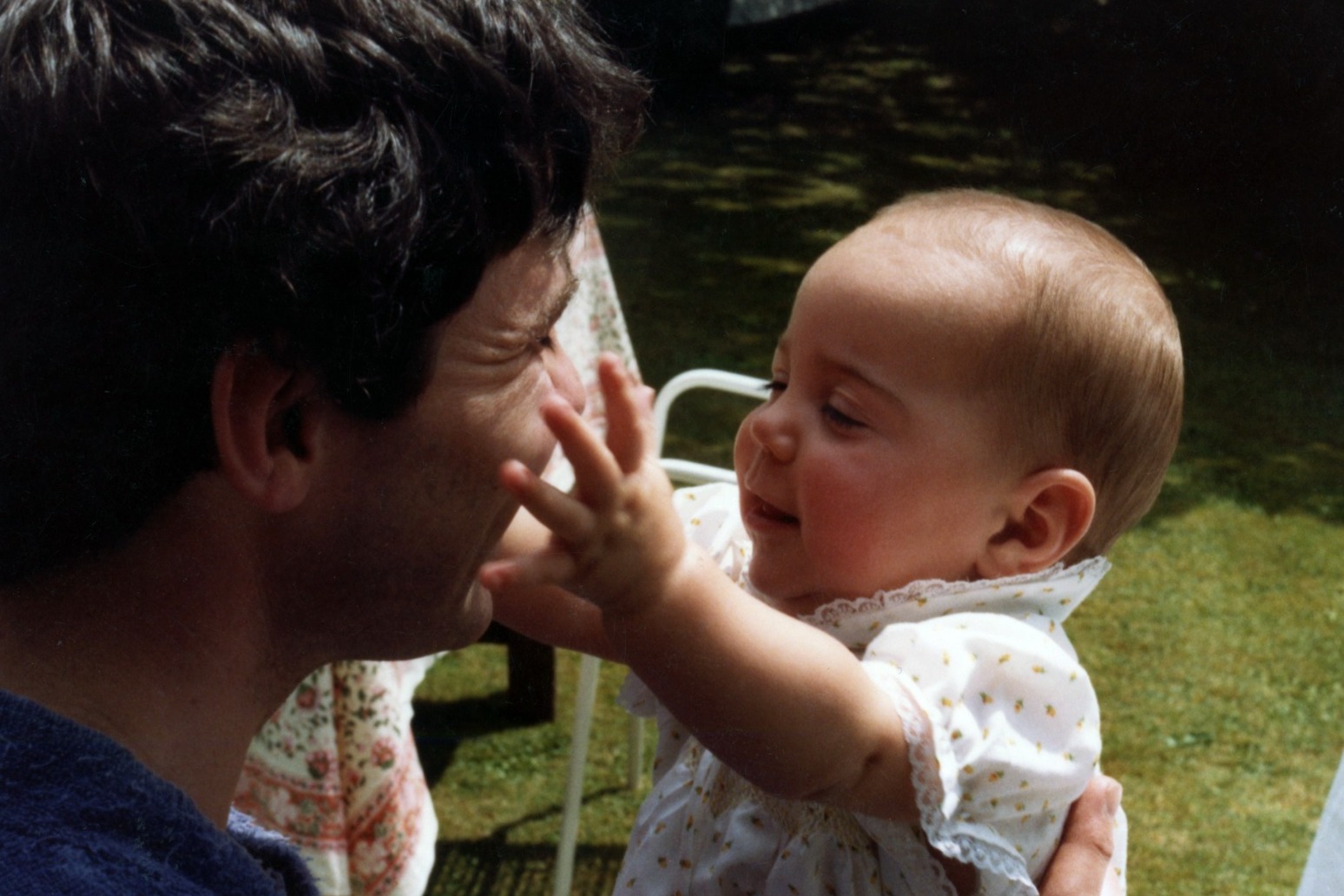 Kate shares a baby photo of her smiling with her father 