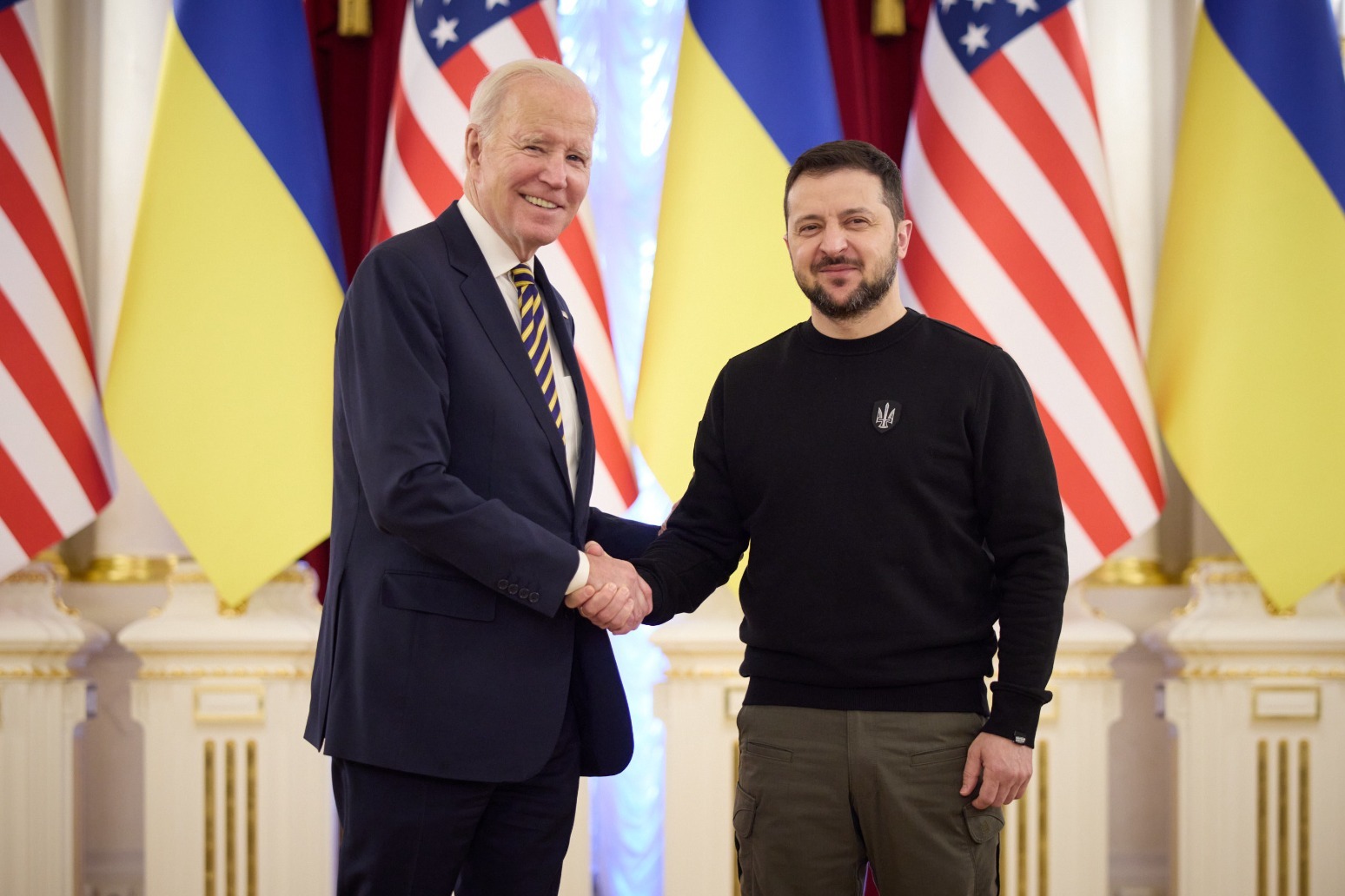 Biden visits Kyiv and says ‘democracy stands’ in Ukraine ahead of anniversary 