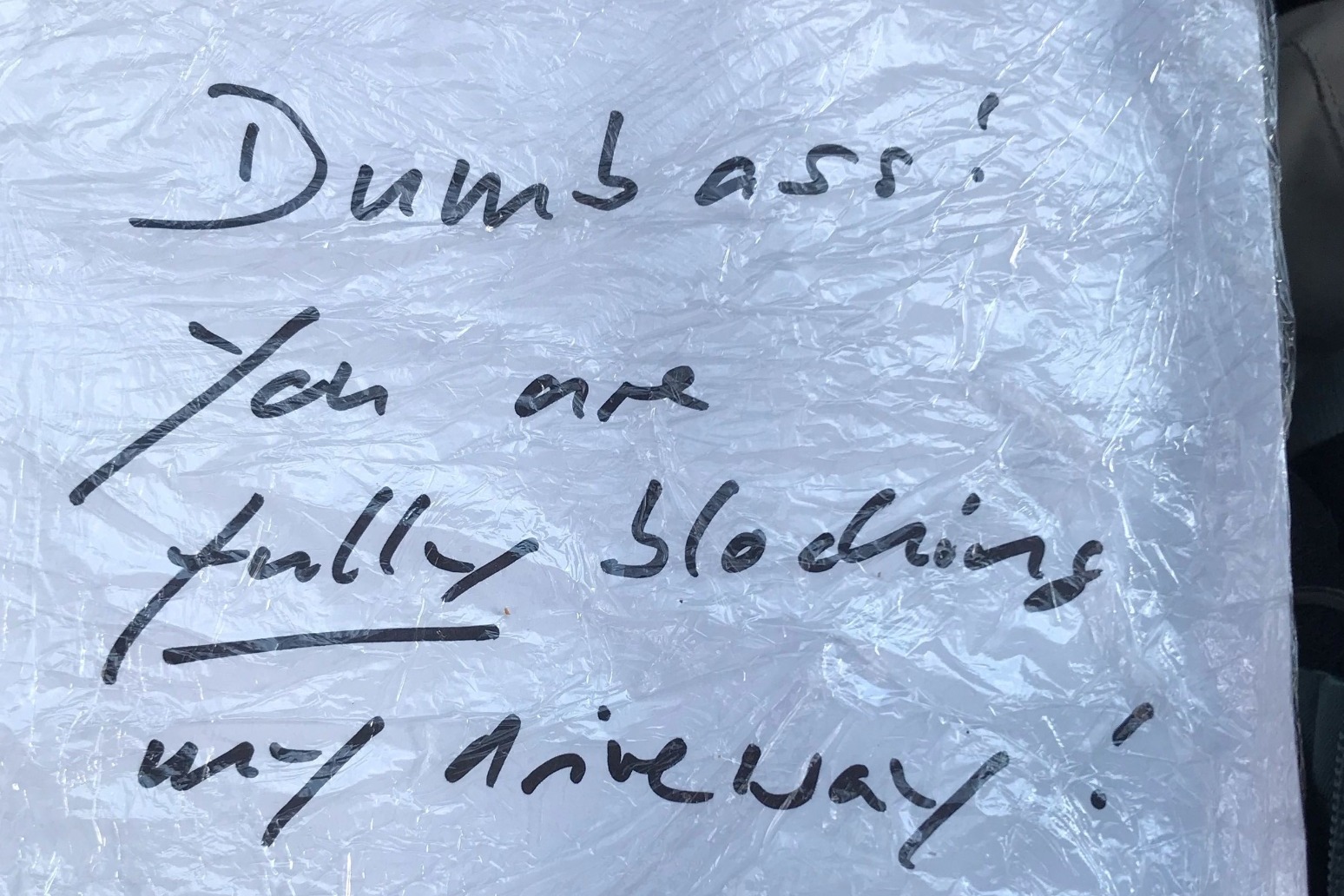 DISGRUNTLED RESIDENT LEAVES NOTE INSULTING PARAMEDICS FOR BLOCKING DRIVEWAY 