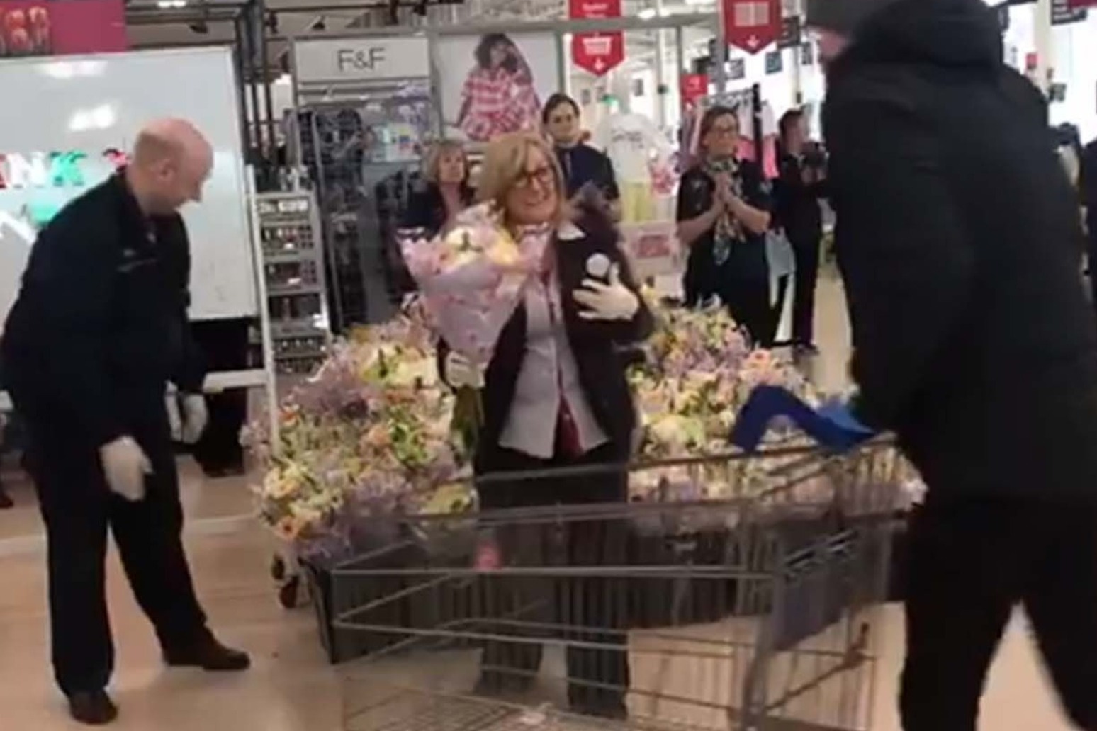 NHS workers given round of applause and flowers by Tesco staff 