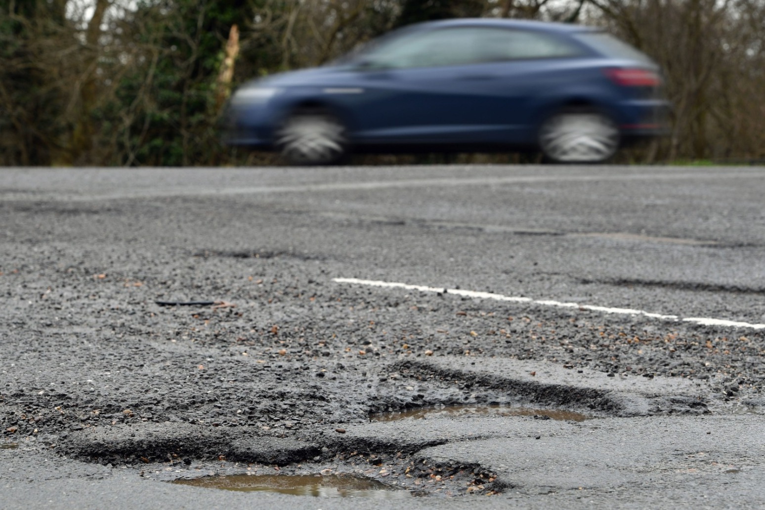 Pothole repairs down by a fifth as council budgets fall 