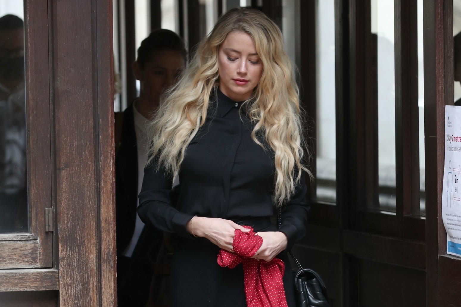 Amber Heard settles US defamation lawsuit with former husband Johnny Depp 