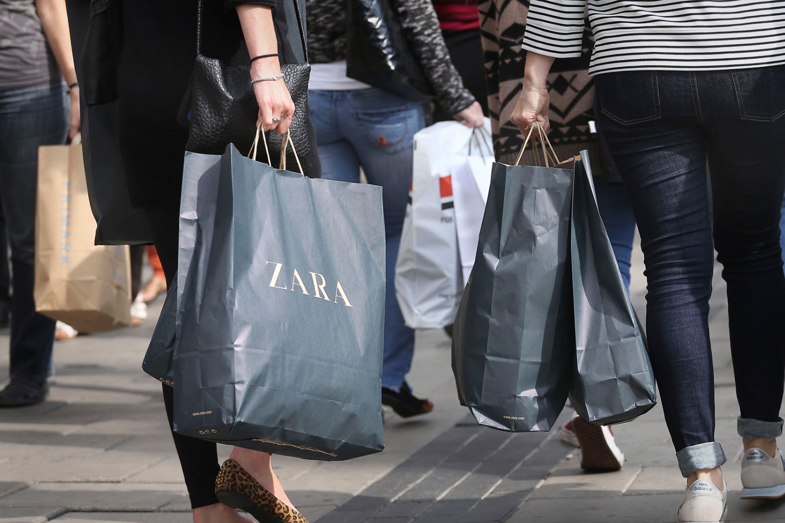 BIGGER DISCOUNTS FROM RETAILERS \'BOOSTED SHOPPER DEMAND FOR GOODS IN OCTOBER\' 